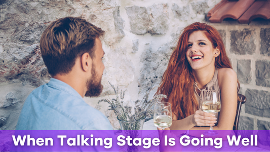 a couple on a date with clear signs the talking stage is going well